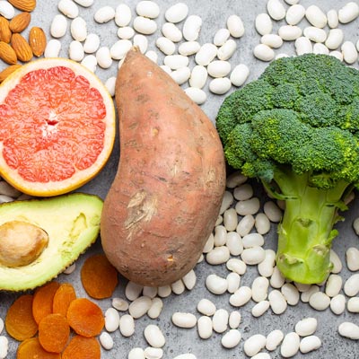 picture of potato, broccoli, nuts and avocado 