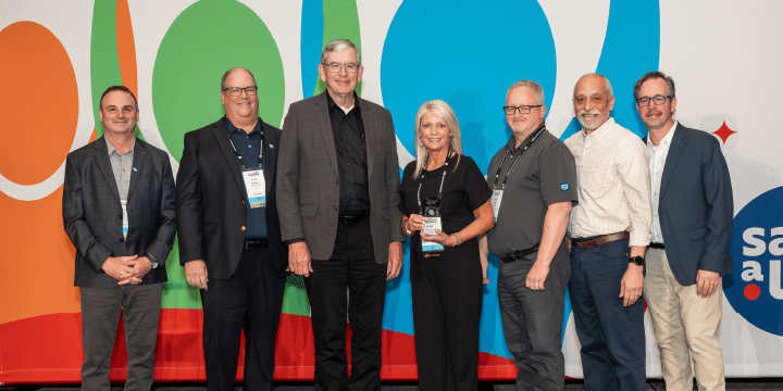 Kristin Hammond MOY from l to r: Bill Mayo, Save A Lot Chief Development Officer, Fred Boehler, Save A Lot CEO, Joey Hays, Save A Lot Retail Partner, Kristin Hammond, Manager of the Year, Kevin Nolen, Save A Lot Area Business Consultant, Kelly Lemos, Save A Lot Regional Director and Mark Kotcher, Save A Lot SVP of Sales