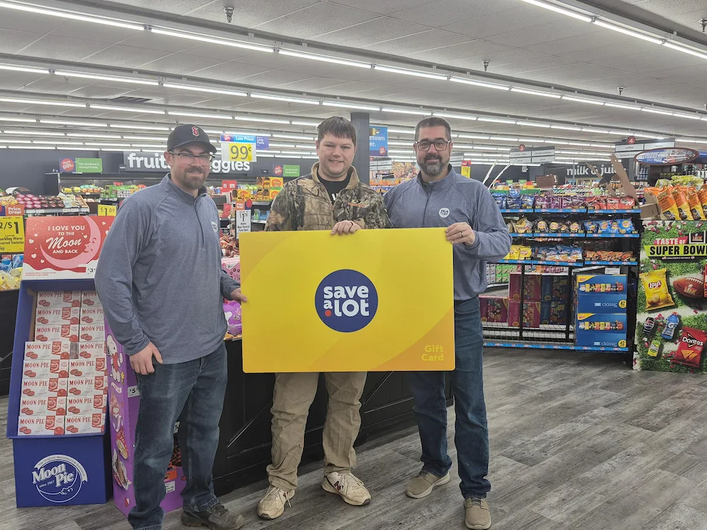 Wellsville, OH
Christopher Herubin, store owner, Rob Woodburn, winner, Chris Herubin, store owner.