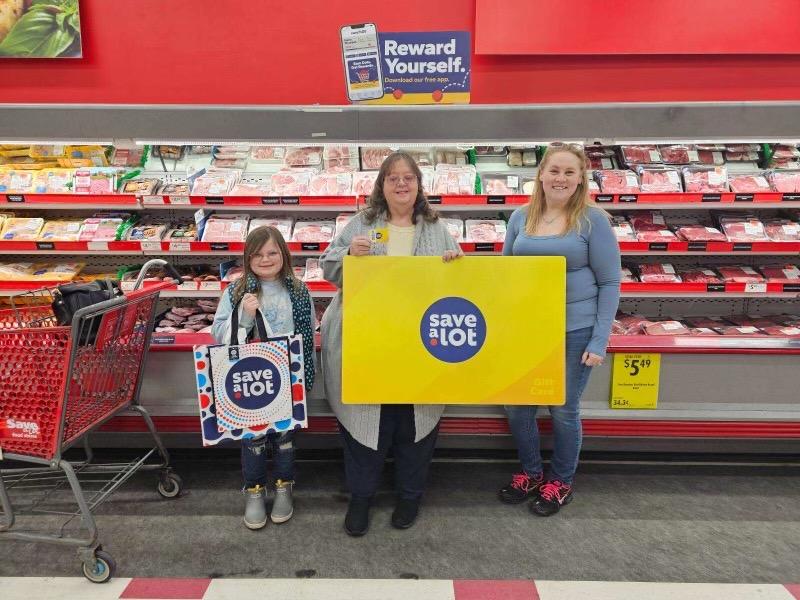 L to R: Brinkley, Ruth Kennedy, winner, Chloe Cooper Store Manager - Greensboro, MD