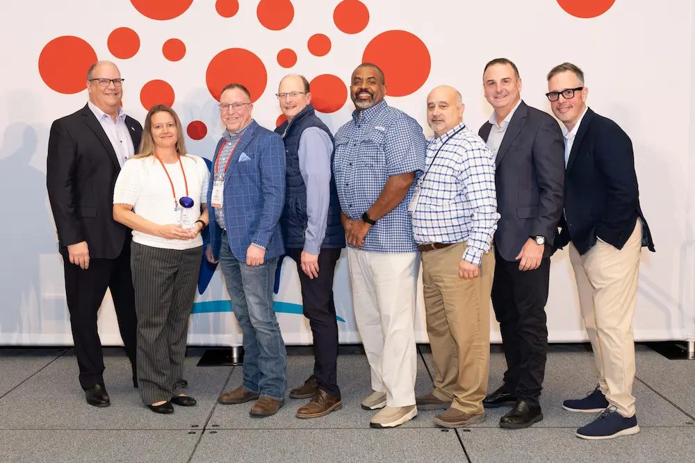 From left to right is: Fred Boehler, Save A Lot CEO, Jamie Holbeck, Manager of the Year, Terry Louth, Kessel Enterprises, Joe Pender, Kessel Enterprises District Manager, Darryl Newton, Save A Lot Area Business Partner, Fred Phillips, Save A Lot Regional Director, Bill Mayo, Chief Operating Officer, Mark Kotcher, Senior Vice President of Sales and Operations