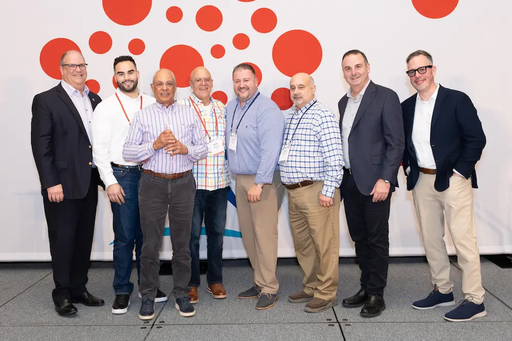 From left to right is: Fred Boehler, Save A Lot CEO, members of the Flores group, Ed Wujcik, Save A Lot Area Business Partner, Bill Mayo, Chief Operating Officer, Mark Kotcher, Senior Vice President of Sales and Operations