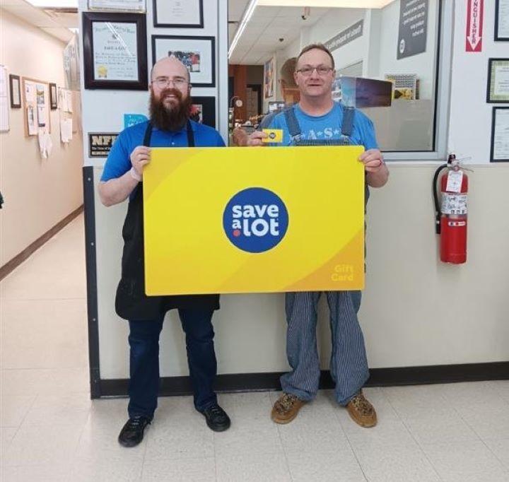 L to R: Store Manager Daniel and Freddie Davis, Winner, Lexington, TN
