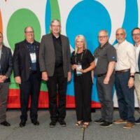 Kristin Hammond MOY from l to r: Bill Mayo, Save A Lot Chief Development Officer, Fred Boehler, Save A Lot CEO, Joey Hays, Save A Lot Retail Partner, Kristin Hammond, Manager of the Year, Kevin Nolen, Save A Lot Area Business Consultant, Kelly Lemos, Save A Lot Regional Director and Mark Kotcher, Save A Lot SVP of Sales