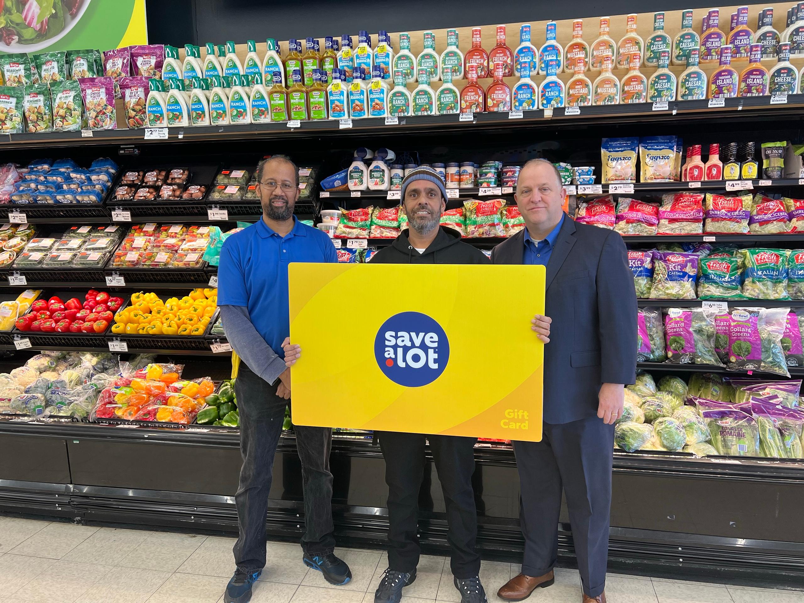 Brookhaven, PA Store Manager Guy Jones, Robert Ramos, winner, John Palmer, Operations Director