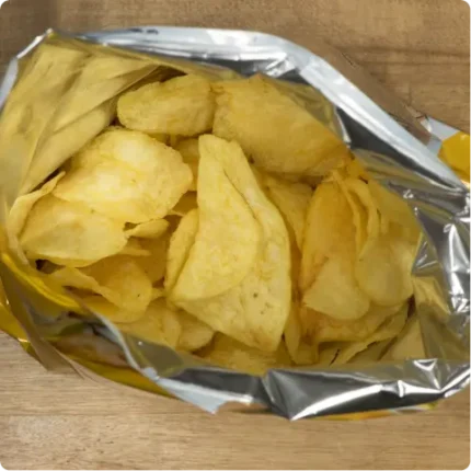Potato chips bag opened to reveal chip to air ratio