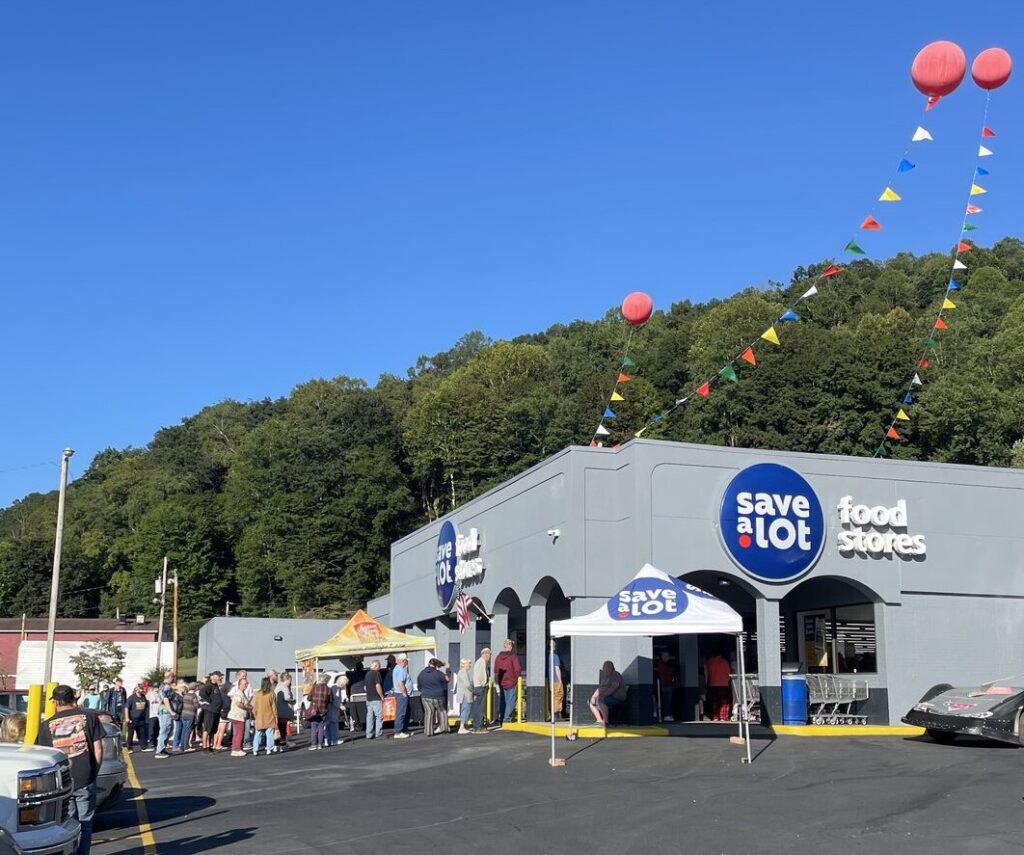People standing in line outside the store.