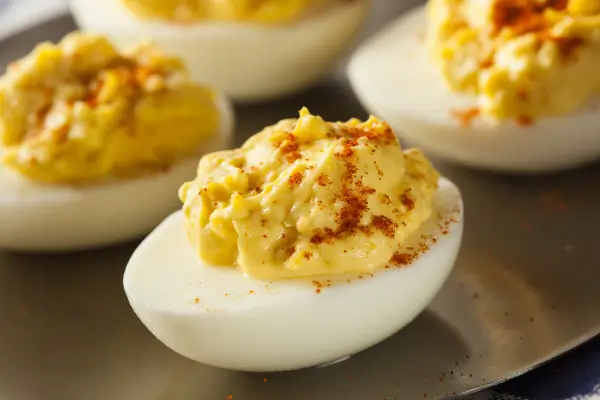Simple Deviled Eggs recipe using Kurtz Mayonnaise, Yellow Mustard, and White Vinegar